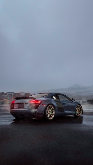 Audi R8 sports car on a wet road