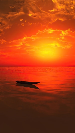 Boat on the water during sunset