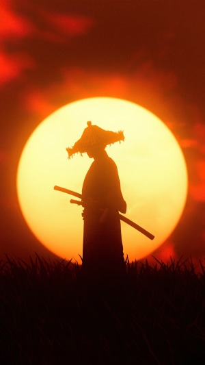 Samurai with sword in front of sunset