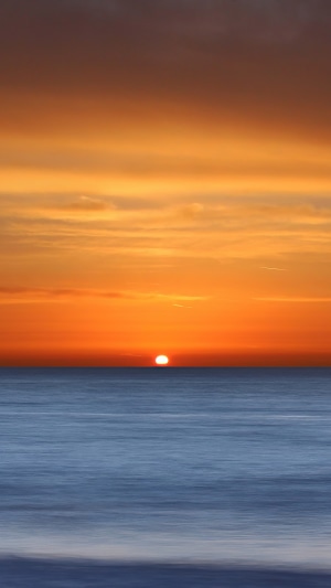 Sunset over the ocean 4K