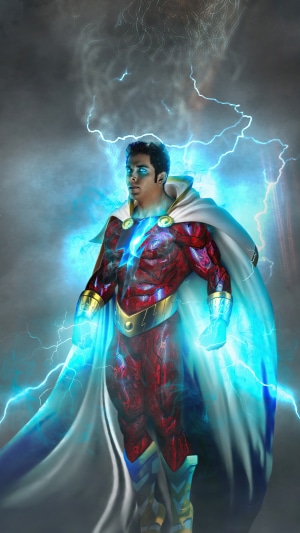 Shazam surrounded by lightning and smoke