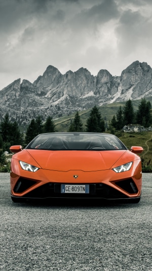 Orange Lamborghini Huracan Evo Spyder in mountains