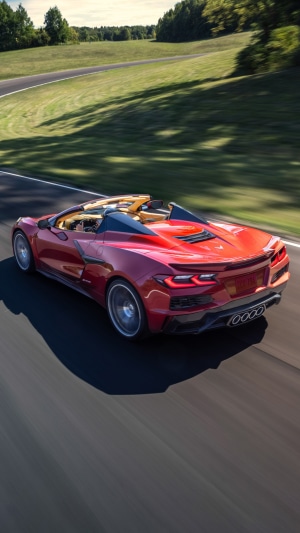 Red Chevrolet Corvette Z06 Convertible on a Racetrack