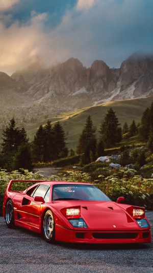 Red Ferrari F40 in a Mountain Landscape