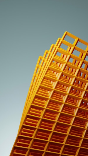Abstract yellow grid structure against a blue sky