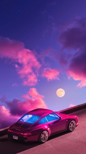 Pink Porsche 911 on a road under a synthwave sky