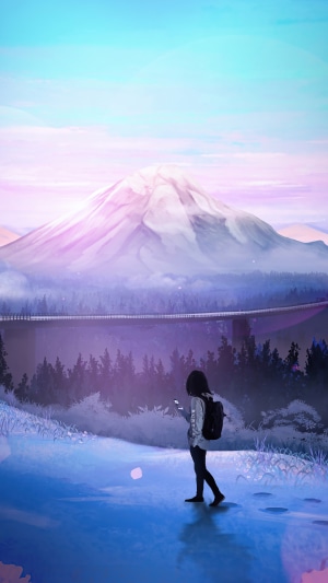 Girl with backpack looking at phone with mountain background
