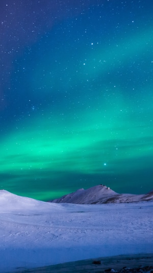 Northern Lights over Snowy Mountains 4K