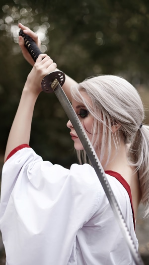 Ciri from The Witcher 3 holding a katana