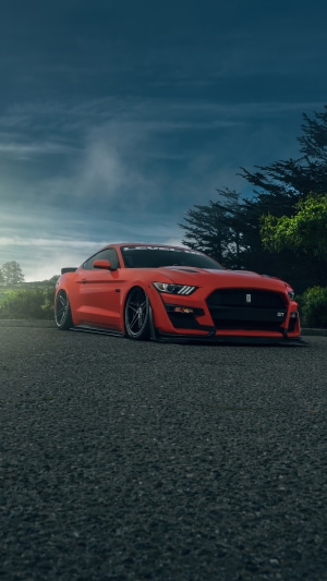 Red Ford Mustang GT on a Road
