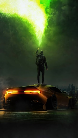 Man on a car with green smoke