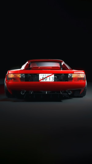 Red Ferrari Testarossa rear view with Japanese license plate