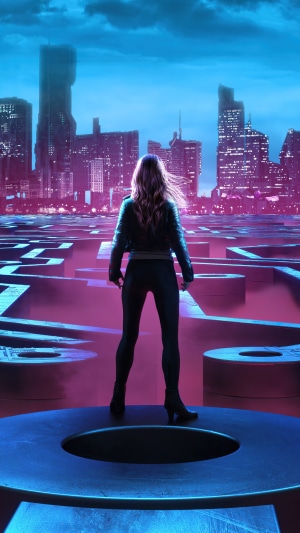 Woman in a maze with a futuristic city skyline