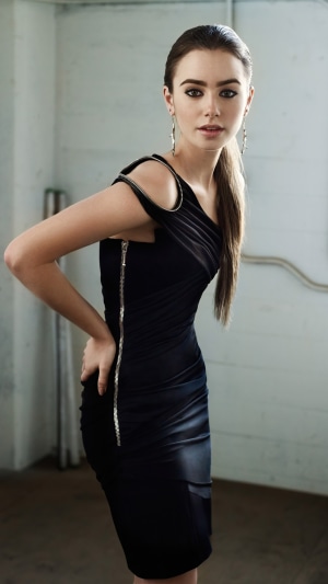 Lily Collins in a black dress