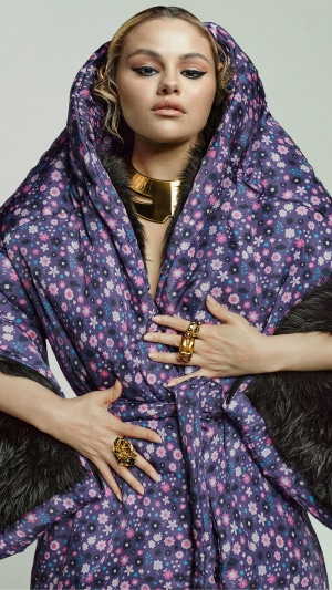 Selena Gomez in floral robe and gold jewelry