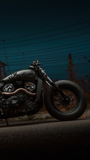 Indian motorcycle parked at night