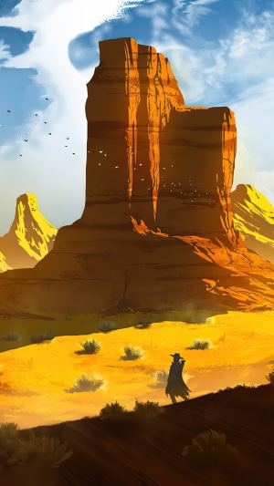 Cowboy in a desert landscape with rock formations