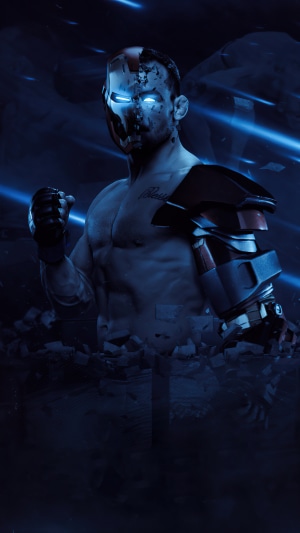 Man with Iron Man-like helmet and cybernetic arm