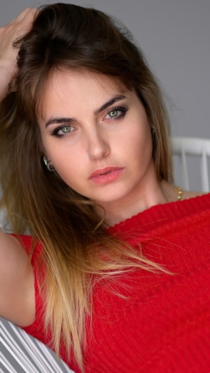 Young woman with blonde hair and makeup