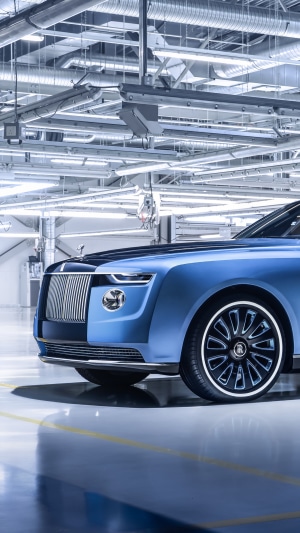 Blue Rolls-Royce Boat Tail in a factory