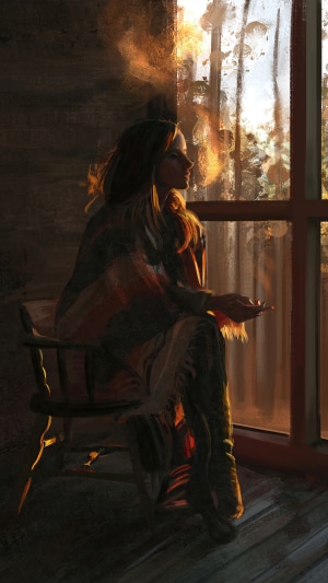 Woman sitting by the window