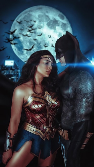 Wonder Woman and Batman in front of the moon