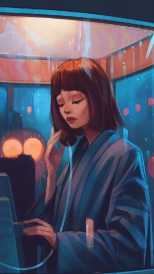 Girl in a phone booth at night