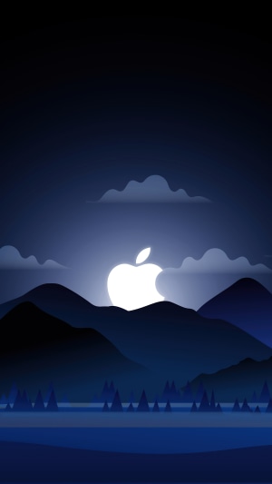 Apple logo rising over mountains at night