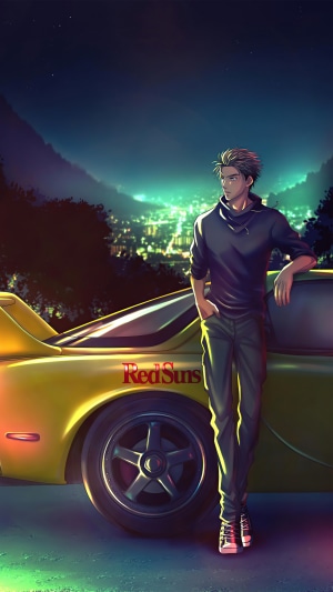 Man leaning on a yellow car with "RedSuns" logo at night