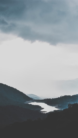 Dark Clouds Over a Mountain Lake
