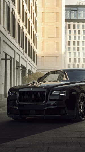 Black Rolls-Royce Wraith parked on a city street