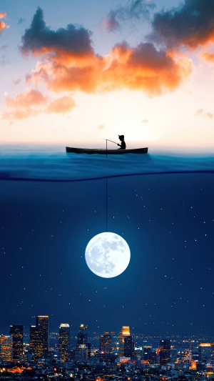 Boy fishing from boat with moon hanging in water over city