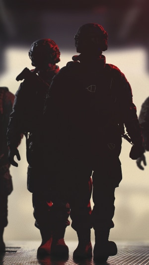Soldiers in tactical gear walking