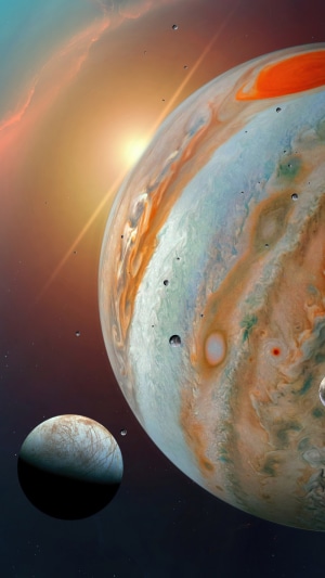 Jupiter and its moon Europa in space