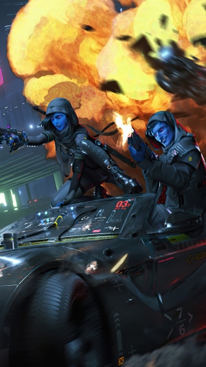 Two blue-skinned figures in a vehicle during an explosion