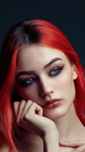 Woman with red hair and blue eyes