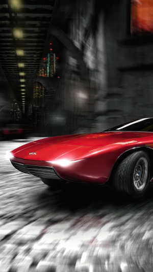 Red concept car driving through a blurry city at night