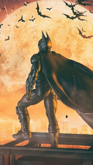 Batman in front of a large moon with bats