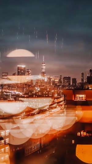 New York City skyline at night with bokeh effect