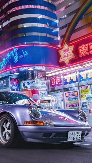 Purple Porsche 911 in Tokyo at Night