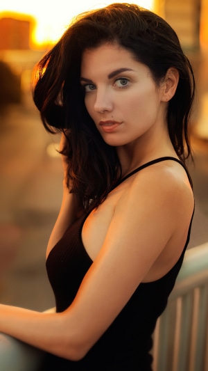Model in black dress at sunset 4K