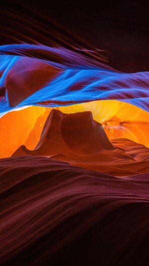 Antelope Canyon rock formations with colorful light