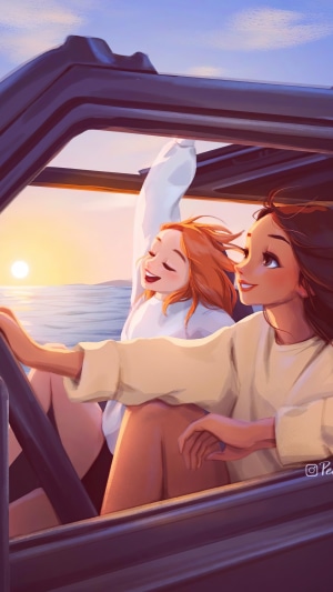 Two girls in a car at sunset
