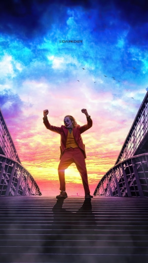 Joker on a bridge at sunset