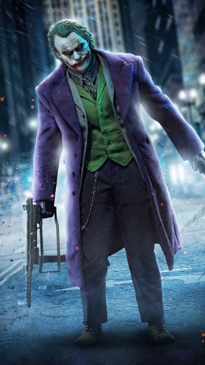 The Joker from DC Comics with a gun