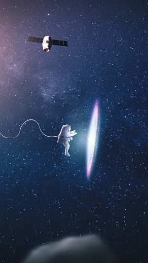 Astronaut and satellite in space near a portal