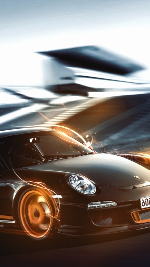 Black Porsche 911 with orange light trails