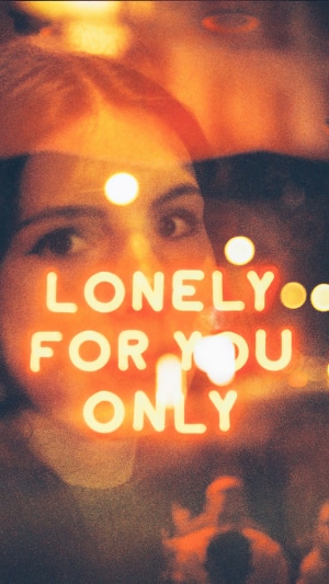 Neon sign "Lonely For You Only" with woman