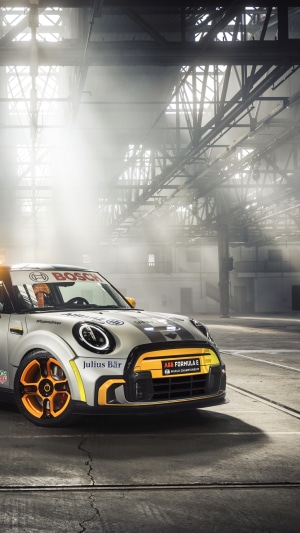 Mini Cooper Formula E race car in warehouse