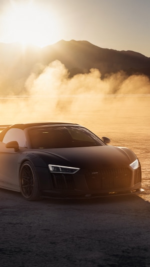Black Audi R8 Convertible in Desert at Sunset